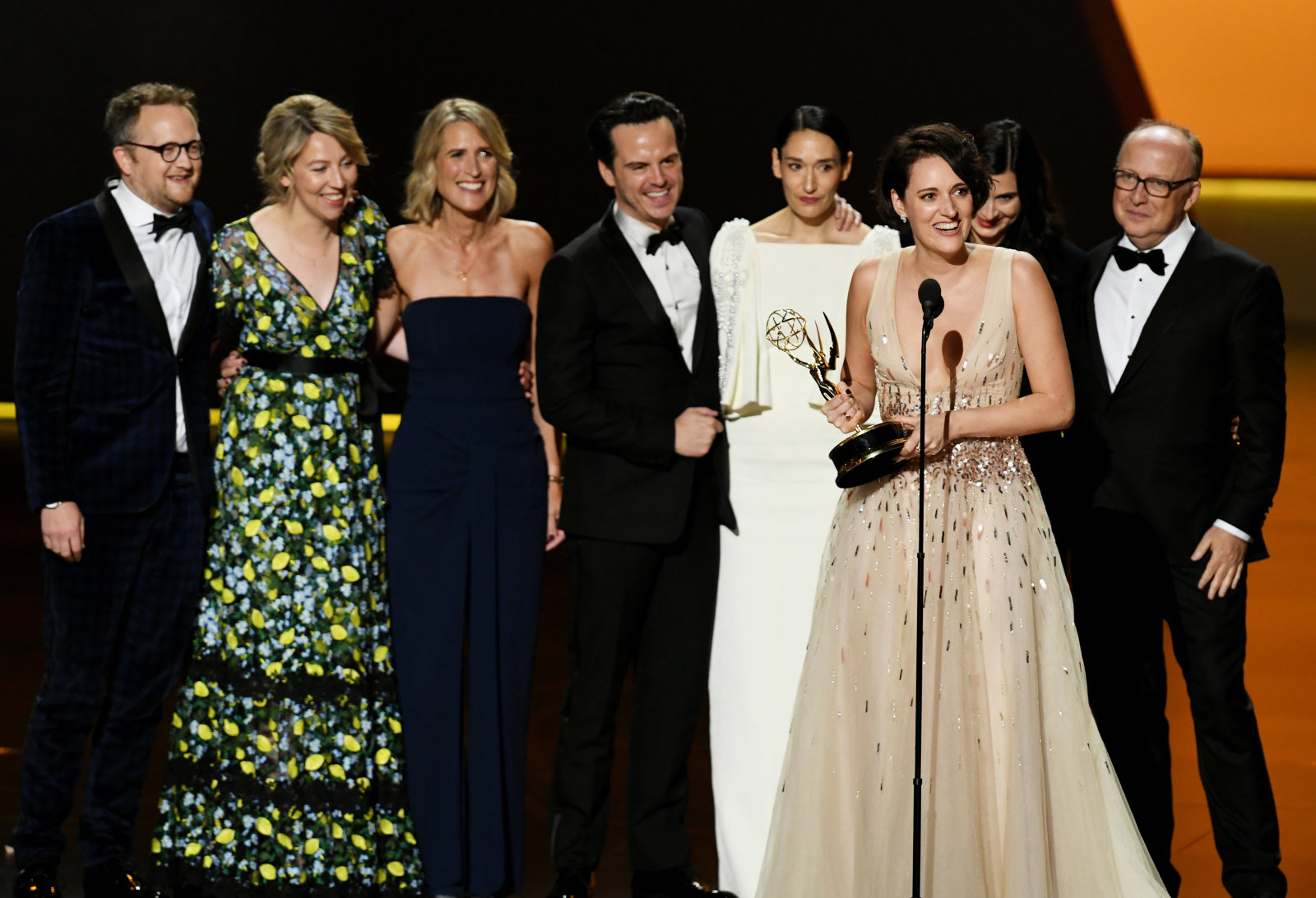 Phoebe Waller-Bridge (speaking) and fellow cast and crew members of 'Fleabag' accept the Outstanding Comedy Series award onstage during the 71st Emmy Awards at Microsoft Theater